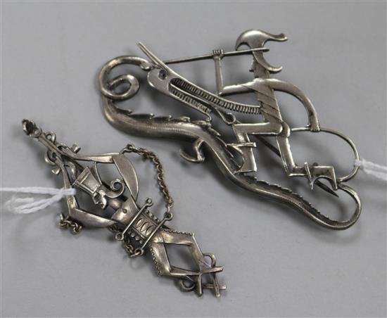 Two stylish mid 20th century Polish silver brooches by Henryk Grunwald, one depicting Prince Krak fighting the Wawel Dragon,